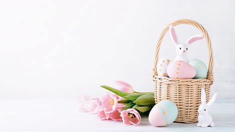 easter basket with eggs and tulips