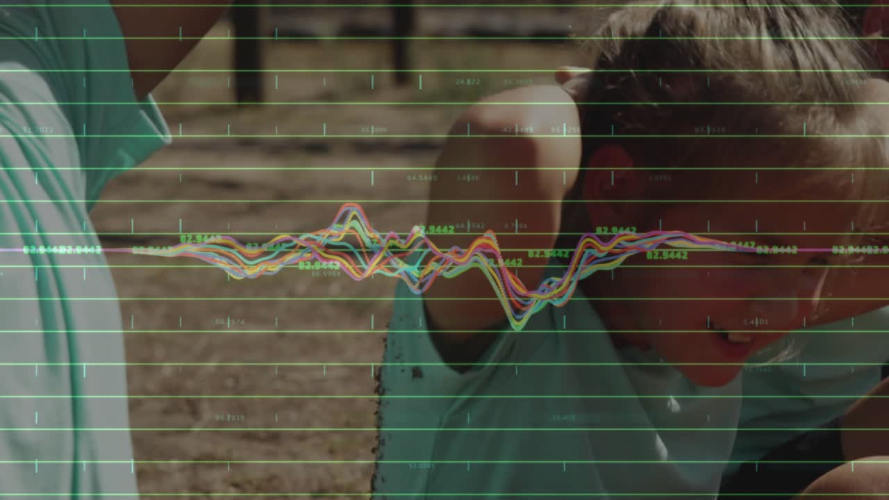 Central child tucking chin and curling into repeated crunches while waveform peaking to show effort