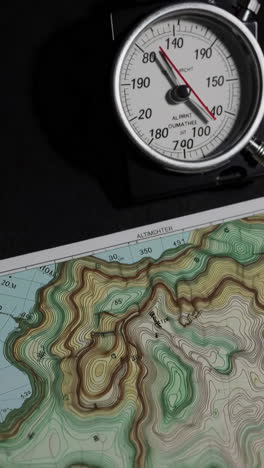topographic map with altimeter and stopwatch