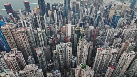 an aerial view of a city with tall buildings