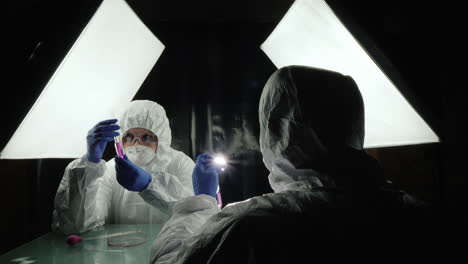 two lab technicians work in the lab