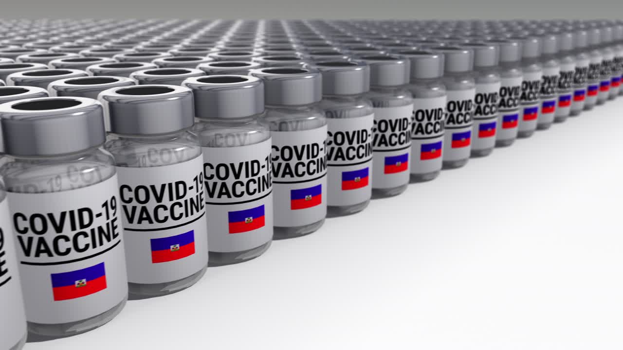 botellas de vacuna contra el covid-19 haiti