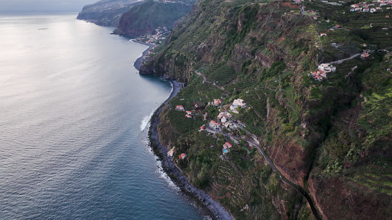 Impressive terraced farming on steep cliffside, Cascata dos Anjos, Madeira