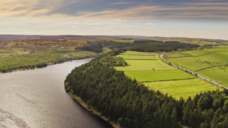 aerial shot of a typical british countryside landscape with farmland and rivers