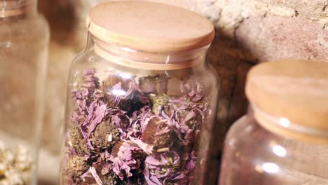 dried flowers in glass jars