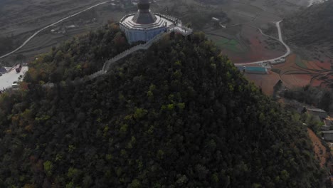 Reveal-shot-of-famous-Lung-Cu-Flag-Point-at-Vietnam,-aerial