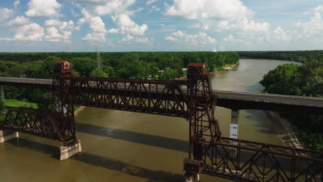 Aerial-View-Of-Bridge-And-Old-Railway-In-Twin-City-Riverfront-Park,-Arkansas,-USA---drone-shot