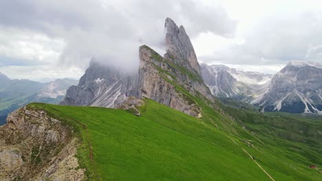 misty epic contrast unfolds as sun highlights seceda and furchetta in bolzano