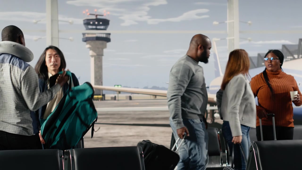 Men and women in airport standing up from chairs after hearing flight announcement