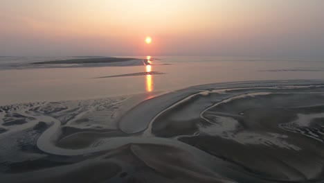 sunset over german islands at the sea