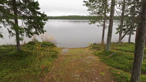 Campervan-Parked-By-The-Lakeshore-On-An-Autumn-Morning-In-Sweden