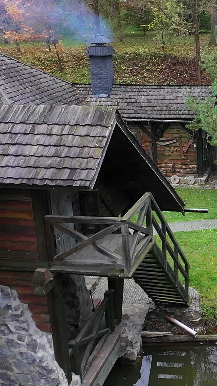 Rest of tourists in autumn forest. Young couple in love enjoying their honeymoon