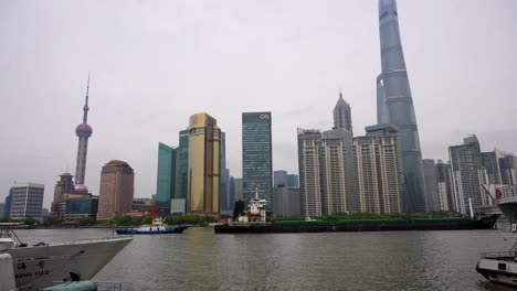 shanghai's pudong skyline and huangpu river with oriental pearl tower