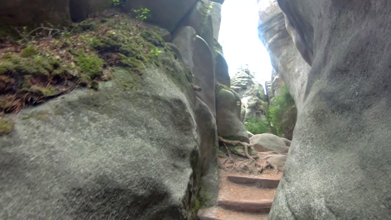 Walking up wooden stairs in national park Adr&scaron;pach Czech Republic