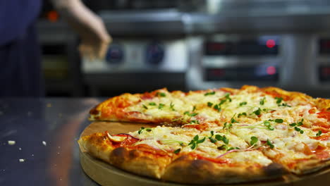 hand taking pizza slice. hot tasty pizza ready to eat. pizza on a wooden board. delicious pizza with fresh green sprouts. close-up.