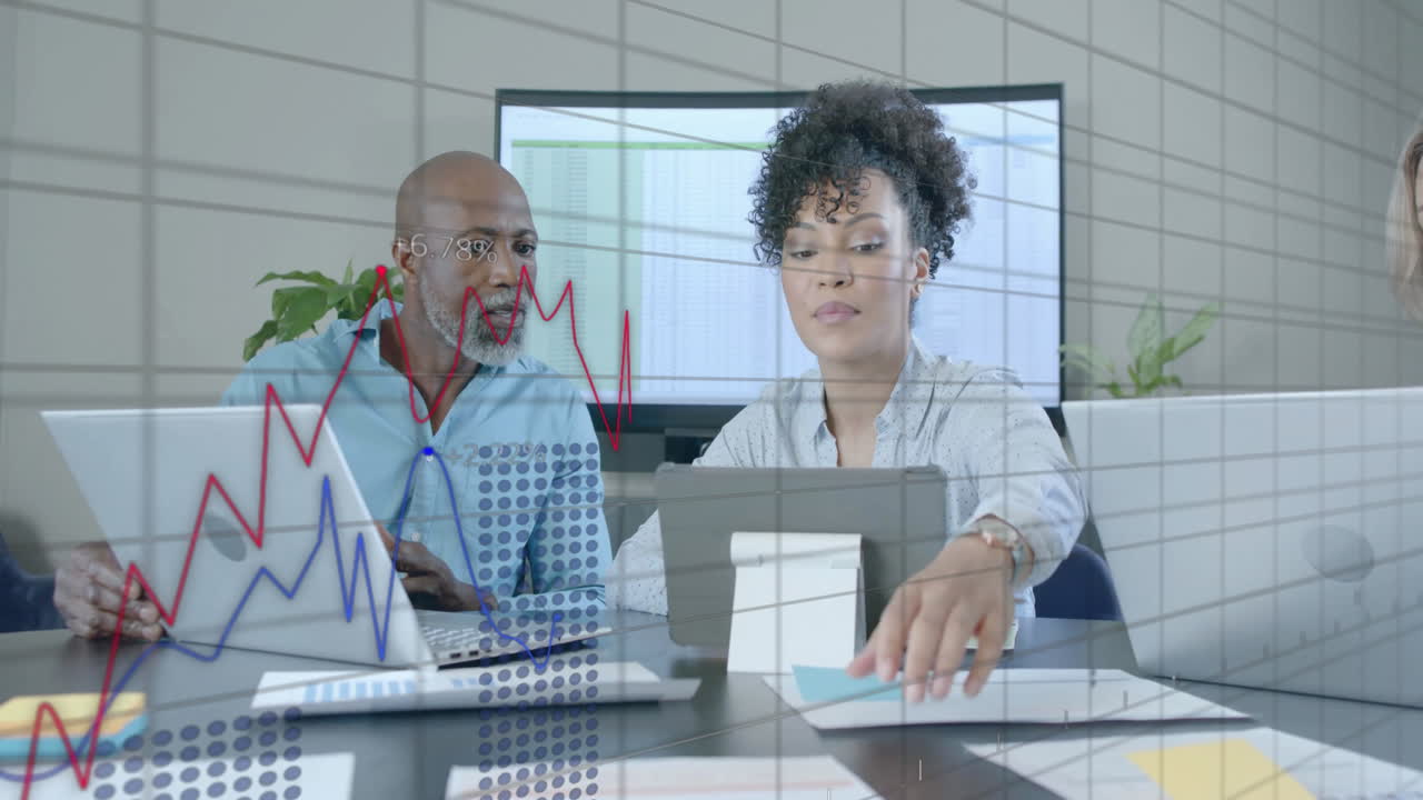 Animation of financial data processing over diverse business people in office