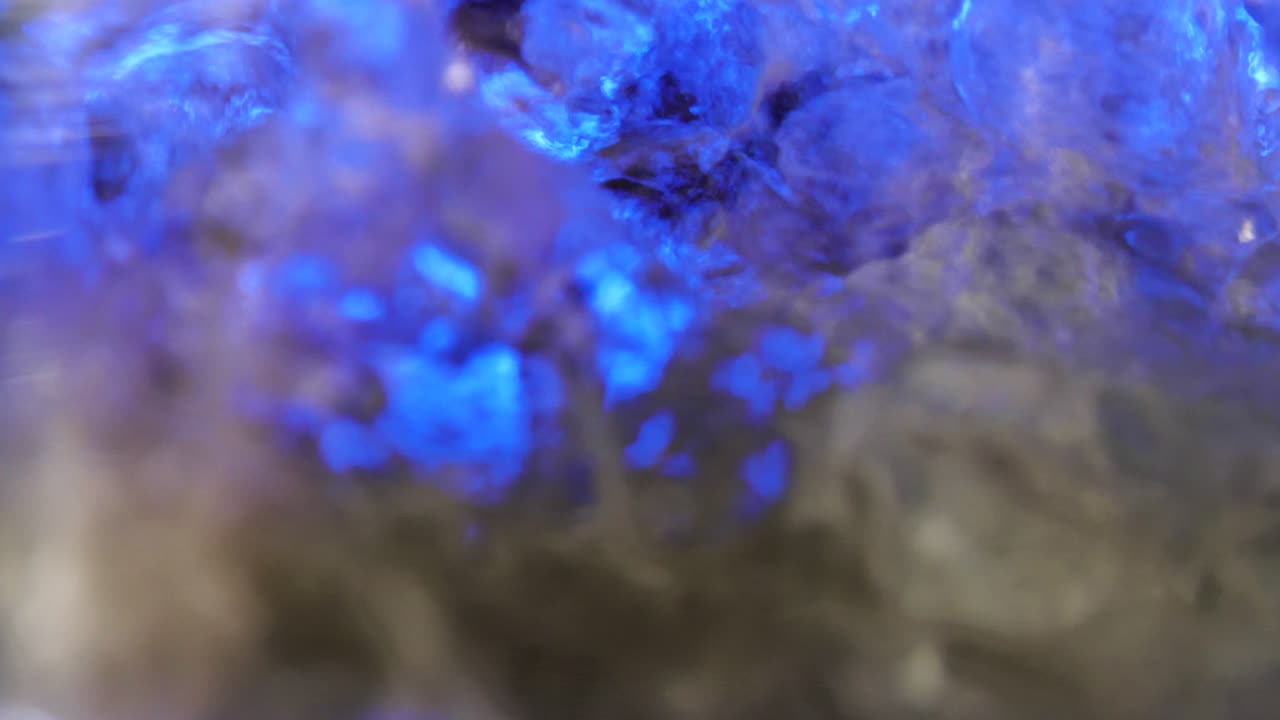 Abstract Blue Light Water Flow