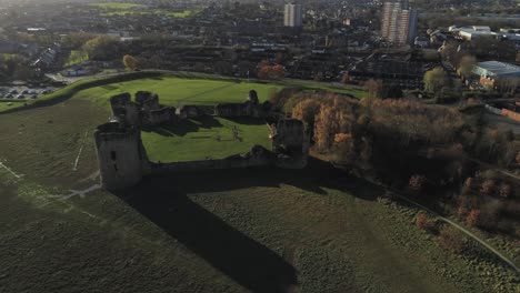 Ancient-Flint-castle-medieval-heritage-military-Welsh-ruins-aerial-view-landmark-wide-orbit-right