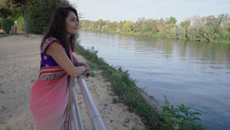 Woman-tourist-wearing-saree-Looking-Over-Horizon