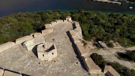 extraordinary architecture of medieval fortress with stone walls and triangle shape in albania