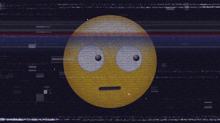 Digital animation of tv static effect over confused face emoji against black background