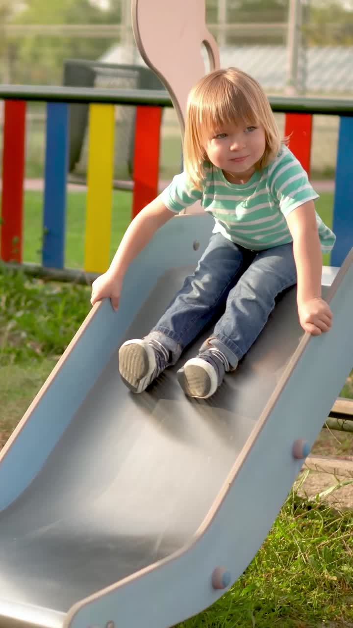 Child on a slide at the playground
