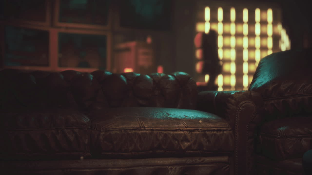 Vintage leather couch in an atmospheric urban setting at night