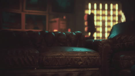 vintage leather couch in an atmospheric urban setting at night