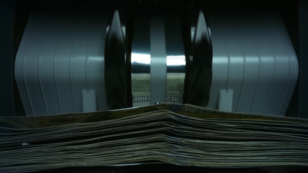Counting machine counting dollar banknotes. Cash money counting equipment