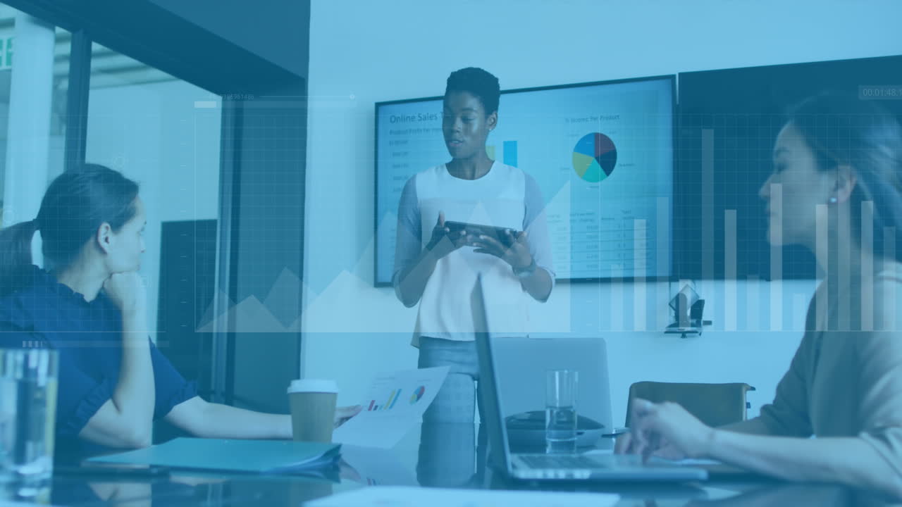 Animation of data processing over african american woman giving a presentation at office