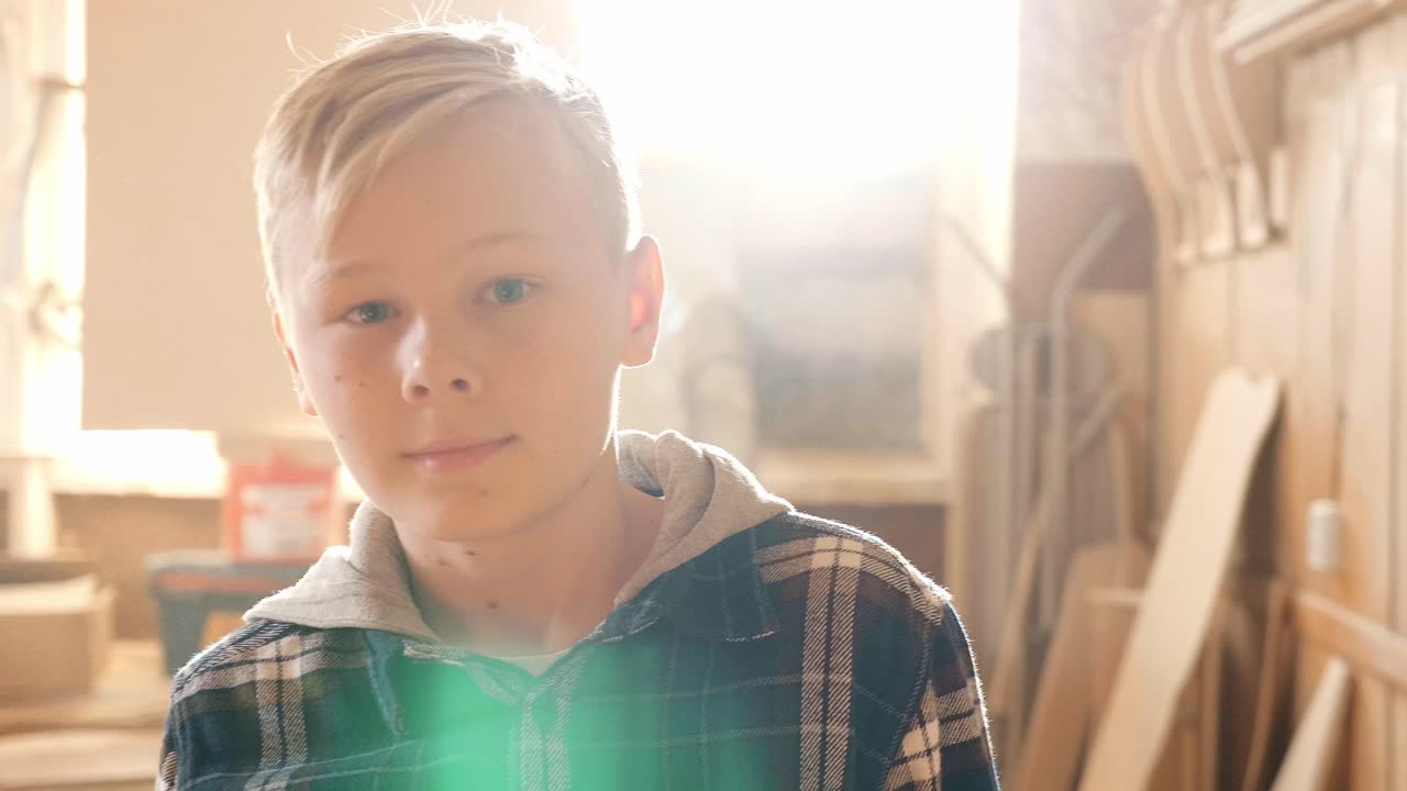 Boy in a Woodworking Workshop