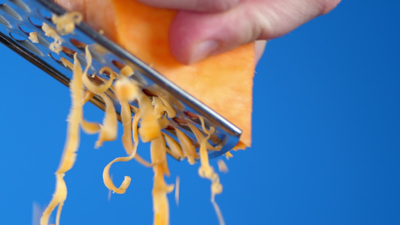 Cheddar cheese grated into small pieces.