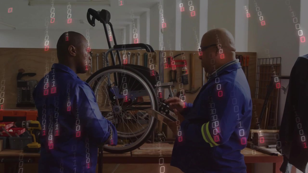 Technicians Repairing a Wheelchair in a Workshop with Digital Data Overlay