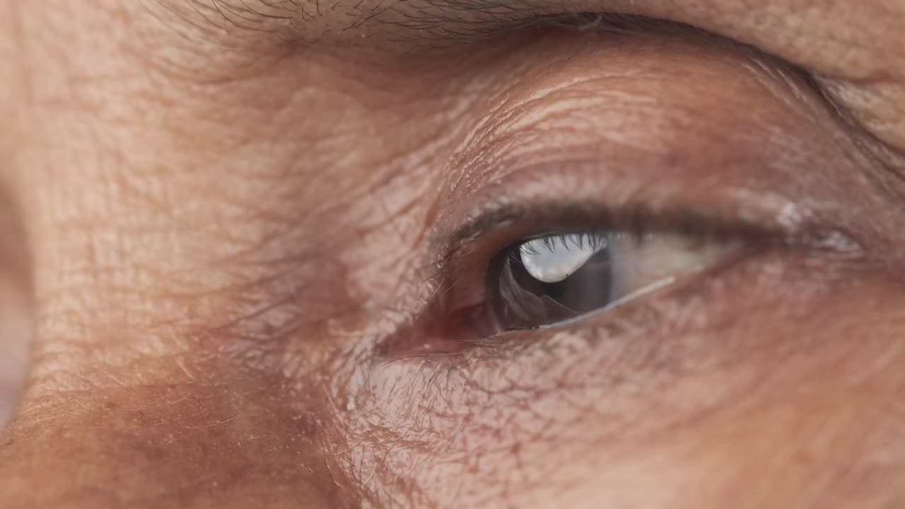 detail shot of senior women eyes looking away