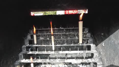 sequential ignition of candles on a staircase