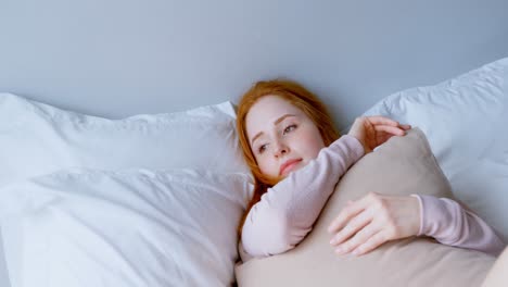 woman relaxing in bedroom at home 4k