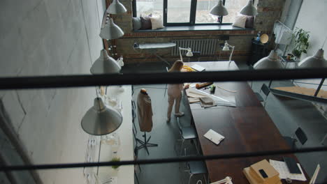 fashion designer at work in a modern studio