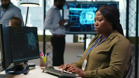 female technician writing code on pc, developing neural networks apis
