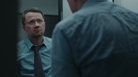 a sad man dress to work