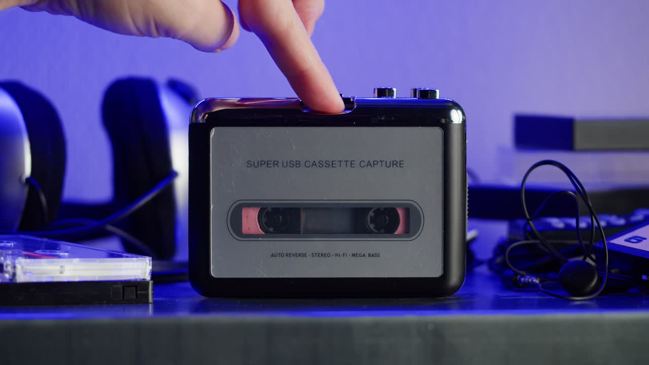 Vintage cassette player on a desk with headphones and tapes creates a nostalgic audio scene, evoking retro vibes