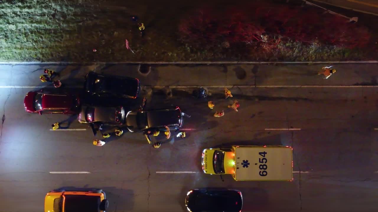 Multi-car accident during rush hour, aerial view, emergency response, Brossard, Canada