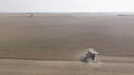 Aerial-Panorama-of-Combine-Harvester-Harvesting-Dry-Soybeans-on-Rural-Farm-Field