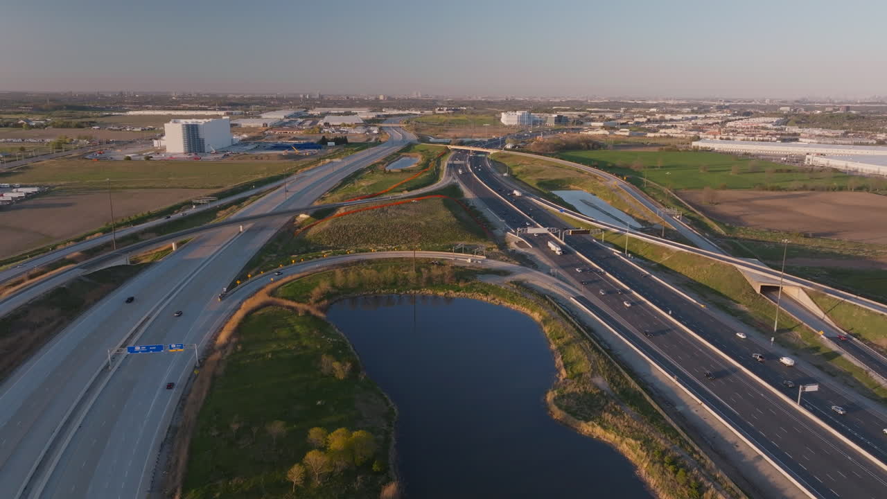 Highway 401 in mississauga, canada, showcasing roads and surrounding landscape, aerial view