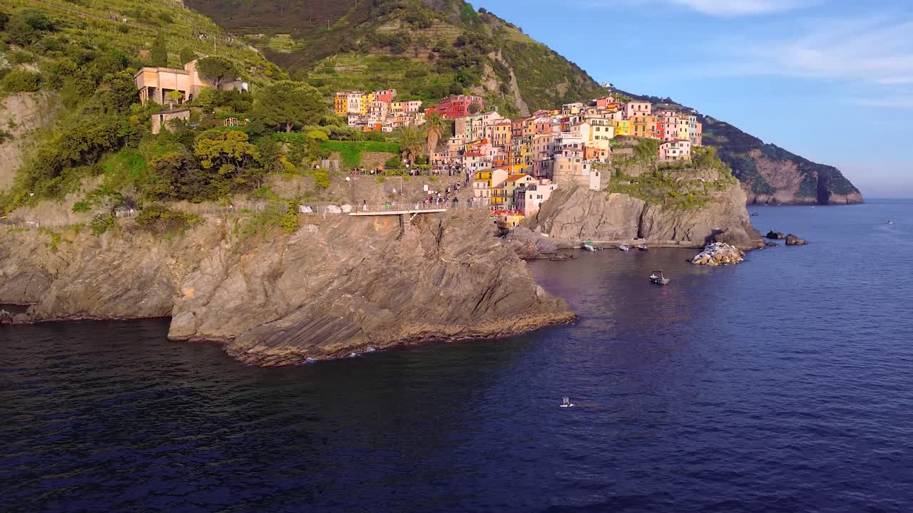 Aerial Sunset View of Manarola, a colorful Cinque Terre Village on the Italian Mediterranean Coast