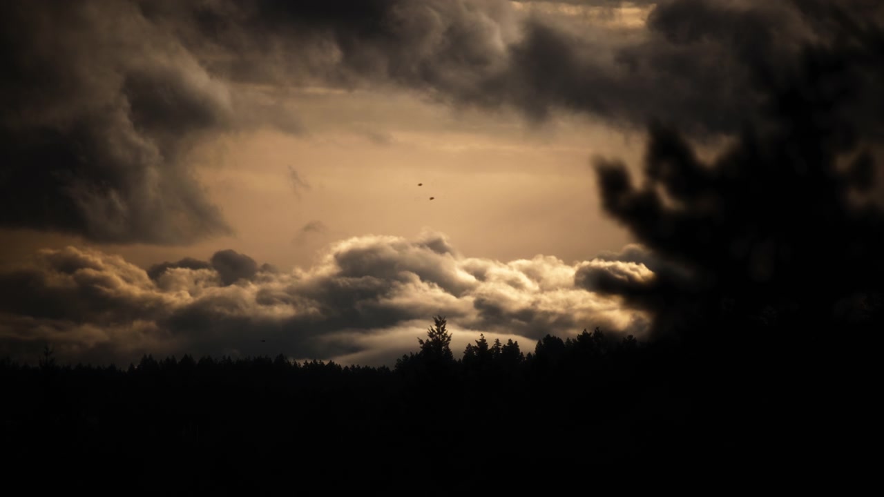 Morning sky covered with moving dramatic stormy clouds