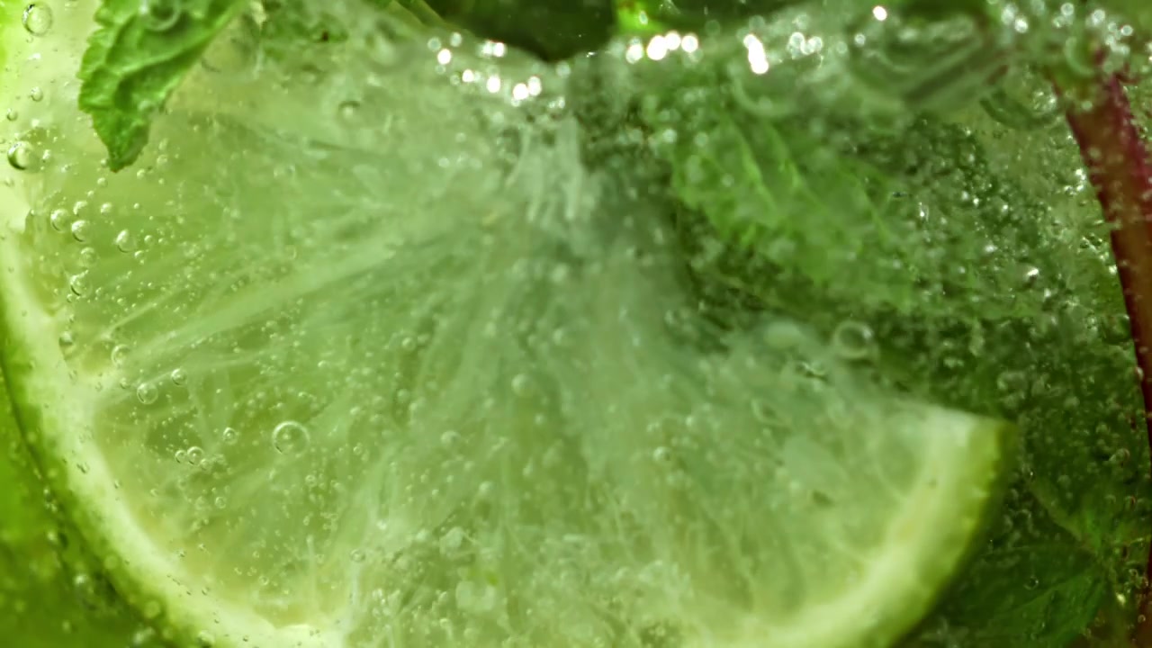 Refreshing Mojito Drink with Lime Slices and Fresh Mint