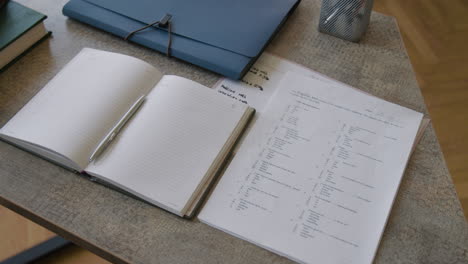 english test paper and study materials on a desk