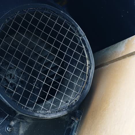 big diameter tube covered with net and twirling core inside. industrial equipment outdoors in the exterior of modern plant. close up