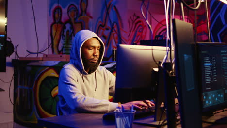 man hacking systems, stealing data