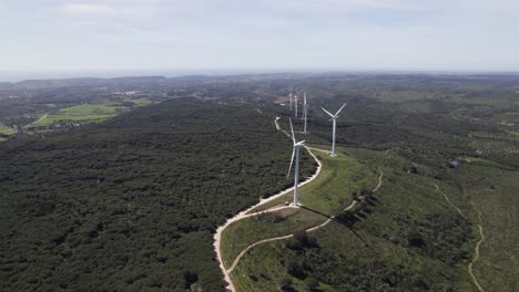 Aerial-circling-shot-of-wind-farm-in-portugese-countryside